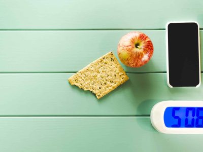 healthy-food-composition-with-alarm-clock